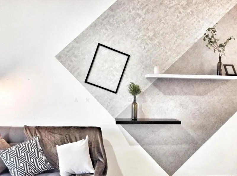 Room features: grey accent wall, white painted wall, floating shelf, decorative vase, framed artwork, decorative plant, throw blanket, decorative cushions; style: modern.