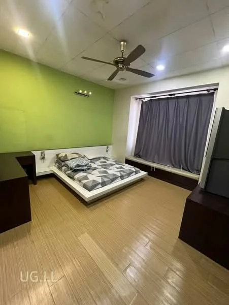 Bedroom features: green accent wall, white painted walls, laminate flooring, queen-size bed with grey and white bedding, ceiling fan, window with grey curtains, built-in wardrobe, side table; style: modern.