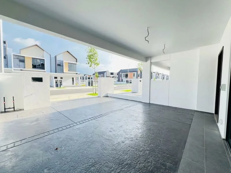 Exterior type: linked terrace house; features: concrete driveway, grey stone flooring, white painted walls, open car porch, landscaped area with grass, modern architectural design, visible neighboring houses, large windows on adjacent houses; style: modern.