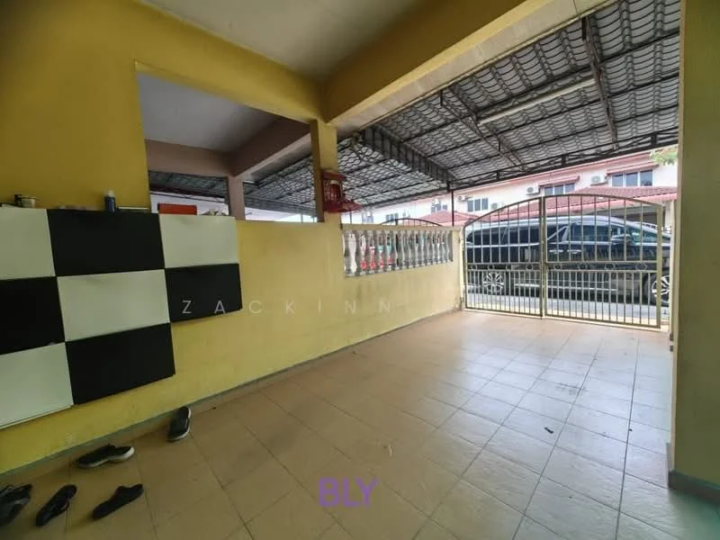 Room features: yellow painted walls, tiled flooring, covered ceiling, open space layout, metal gate, balustrade with decorative pattern, floor-to-ceiling windows, outdoor access, shoes on the floor.