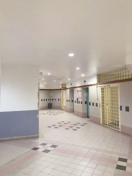Room features: white painted walls, grey accent wall, tile flooring, recessed LED downlights, security grille, corridor layout, decorative floor tiles, wall-mounted signage; style: modern.