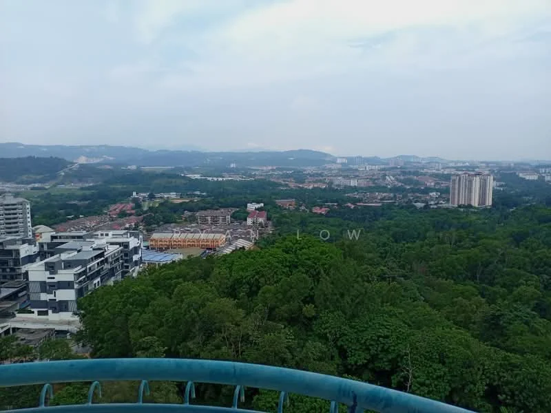 Exterior type: high-rise condominium; features: city skyline view, surrounded by greenery, multiple residential buildings visible, hills in the background, urban landscape, balcony railing in foreground; style: modern.