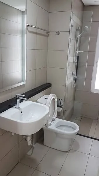Bathroom features: white ceramic toilet, single-sink vanity with chrome faucet, mirror above sink, glass shower enclosure, rain shower head, wall-mounted shower controls, grey tiled walls, light grey floor tiles, black countertop, towel bar, window for natural light; style: modern.