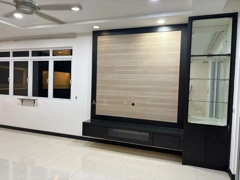 Living features: white painted walls, glossy ceramic tile flooring, tray ceiling, recessed downlights, 5-blade ceiling fan, built-in TV console with storage, glass display cabinet, large windows with white frames; style: modern.