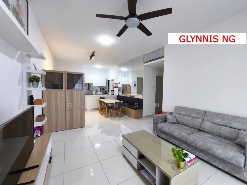 Living features: 3-seater fabric sofa in grey, coffee table, TV console, wall-mounted TV, ceiling fan, white painted walls, glossy tile flooring, open layout to kitchen, decorative wall shelving, natural light from windows; style: modern. Kitchen features: kitchen island, stainless-steel sink, built-in oven, freestanding range oven, white cabinetry, black countertop, refrigerator, open layout to living area; style: modern.