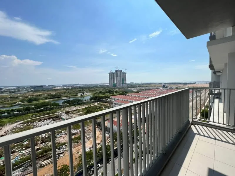 Room features: balcony with railing, tile flooring, city view, open sky, surrounding construction, greenery in the distance, visible water body, urban landscape; view: city.