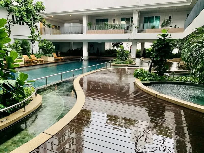 Exterior type: swimming pool deck; features: infinity pool, lap pool, pool deck with loungers, tropical landscaping, manicured garden, water features, wooden decking, surrounding greenery, multiple levels, covered walkways, potted plants; style: modern.