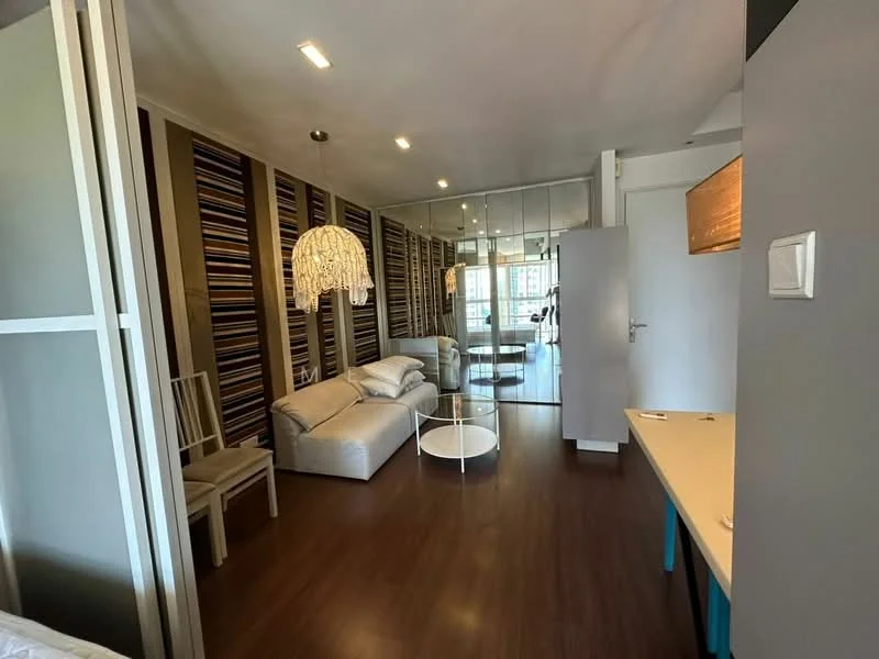 Living features: 3-seater fabric sofa in light grey, white coffee table, wooden flooring, striped feature wall, recessed downlights, chandelier with fringe, large glass sliding door, mirror wall, decorative wall panels, open layout, wall-mounted TV, side table; style: modern; view: city.