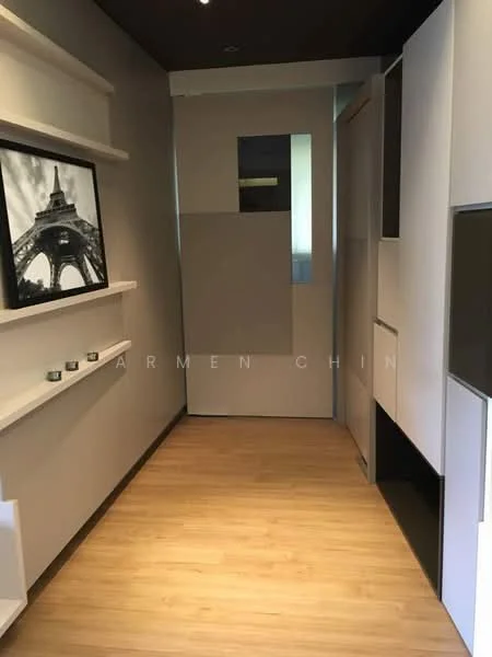 Room features: wooden flooring, grey painted walls, shelves with decorative items, modern door design, recessed lighting, wall-mounted artwork, minimalist cabinetry, neutral color palette; style: modern.