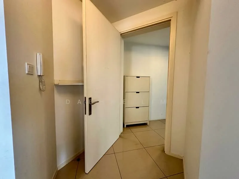 Room features: white painted walls, light beige floor tiles, single white door, built-in storage cabinet, wall-mounted intercom, shelf above the cabinet; style: modern.
