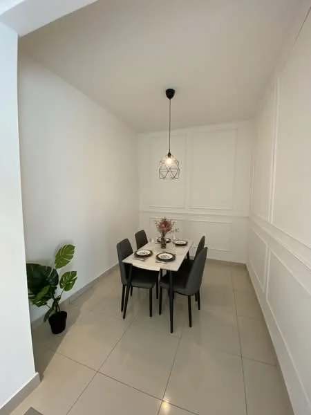 Dining features: white painted walls, tile flooring, 4-seater dining table, black dining chairs, pendant light fixture, decorative wall paneling, houseplant in pot, vase with flowers; style: modern.