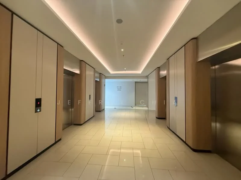 Room features: elevators, marble tile flooring, wood paneling on walls, recessed lighting, modern light fixtures, elevator call buttons, neutral color palette, smooth ceiling, wide corridor; style: modern.