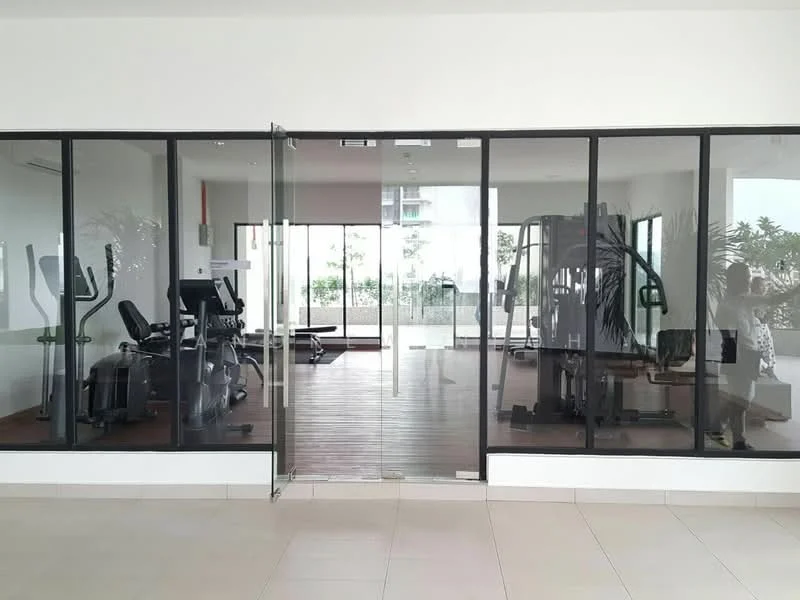Exterior type: gym; features: glass facade, sliding glass door, wooden flooring, fitness equipment visible, indoor plants, natural light from large windows, view of outdoor greenery; style: modern.