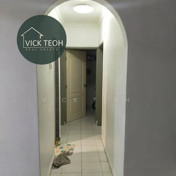 Hallway features: white painted walls, ceramic tile flooring, arched doorway, recessed ceiling light, doorway leading to other rooms, neutral color scheme, visible floor mat, laundry or utility area visible through door; style: minimalist.