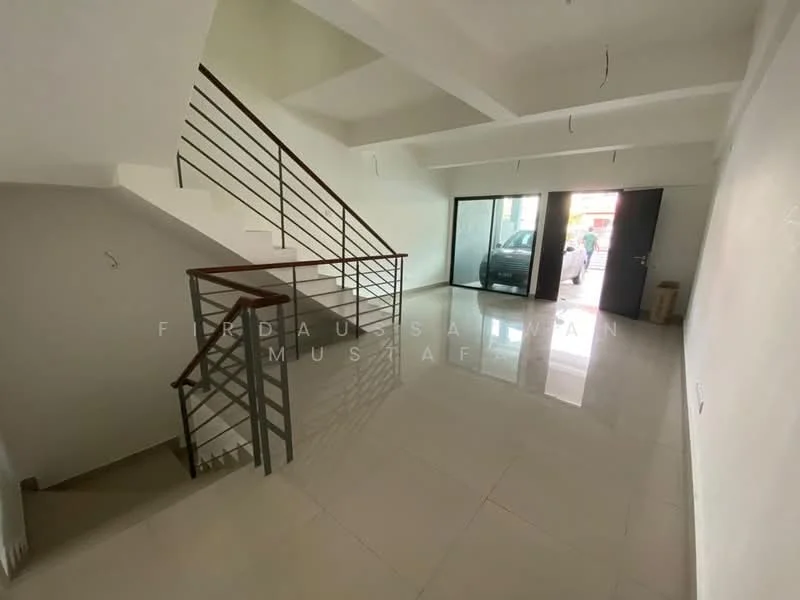 Room features: white painted walls, polished ceramic tile flooring, staircase with metal railing, large glass sliding door, natural light from windows, open space layout, ceiling lights, corner for potential furniture placement; style: modern.