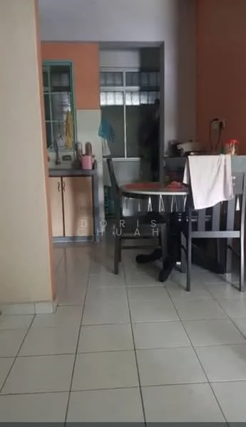 Kitchen features: white tiled flooring, orange painted walls, green cabinets, stainless-steel sink, single-bowl stainless-steel sink, chrome faucet, kitchen countertop, kitchen table with chairs, window with sheer curtains, appliances on countertop.