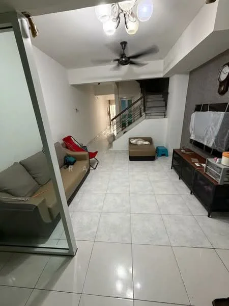 Living features: white painted walls, tile flooring, 5-blade ceiling fan with light, sofa in light grey fabric, red lounge chair, wooden coffee table, TV console, wall-mounted TV, decorative wall clock, staircase leading to upper floor, area rug, window with sheer curtains; style: modern.