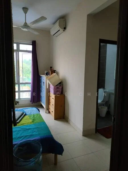 Bedroom features: single bed with blue bedding, ceiling fan, wall-mounted split AC, floor-to-ceiling window, purple curtains, light-colored walls, tile flooring, wooden dresser, blue cabinet, decorative items on dresser; view: garden. Bathroom features: toilet, sink, tile flooring, grey wall tiles.