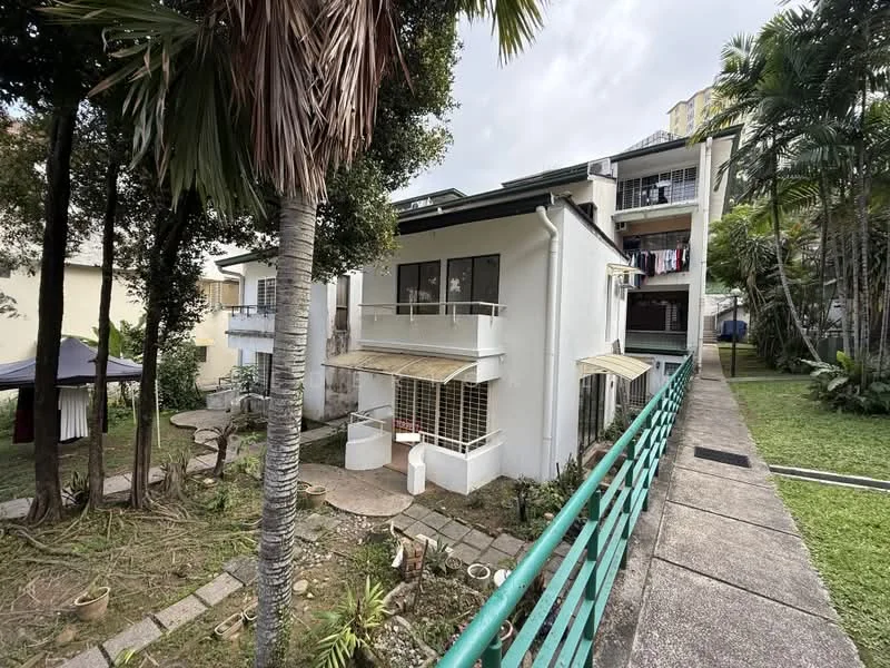 Exterior type: detached bungalow; features: white painted facade, two-storey building, balcony on upper floor, manicured lawn, stone-paved walkway, tropical landscaping, visible laundry on balcony, surrounded by palm trees, garden area with plants, side pathway, green railing; style: modern.