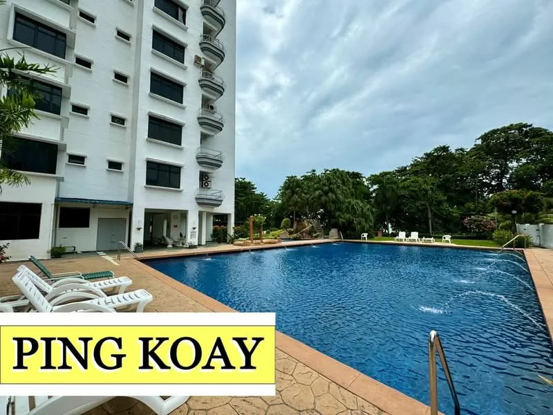 Exterior type: low-rise apartment block; features: swimming pool, pool deck with loungers, landscaped garden, mature trees, white painted facade, balconies, ground floor access, surrounded by greenery; style: modern.