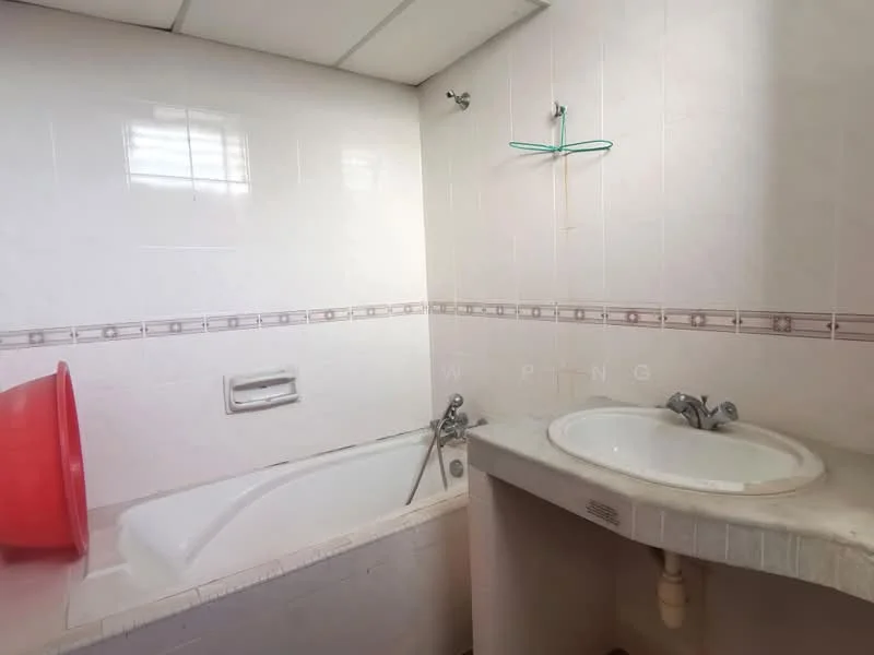 Bathroom features: bathtub, single-sink vanity, chrome basin mixer faucet, white tiled walls, grey countertop, mirror above sink, showerhead, wall-mounted towel rack.