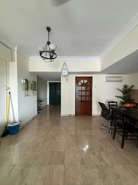 Living features: marble tile flooring, white painted walls, ceiling rose, chandelier, wall-mounted split AC, wooden door with glass panels, clock on wall, dining table with chairs, potted plant, cleaning supplies storage, open space layout; style: modern.