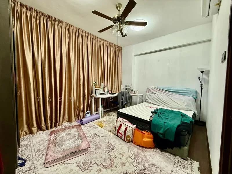 Bedroom features: queen-size bed, upholstered headboard, 3-blade ceiling fan, wall-mounted air conditioning unit, wooden flooring, cream painted walls, floor-to-ceiling curtains in gold, decorative area rug with intricate pattern, side table, lamp, exercise mat, clothing bags; style: modern.