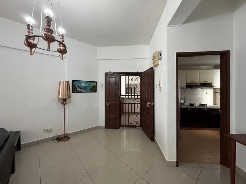 Room features: white painted walls, grey tiled flooring, chandelier with copper finish, floor lamp with cream shade, wooden door with decorative grille, open doorway leading to kitchen, wall-mounted intercom, framed artwork on wall; style: modern.