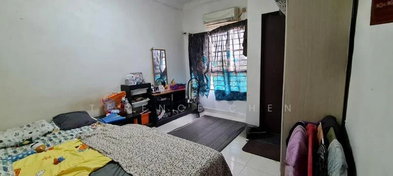 Bedroom features: white painted walls, tiled flooring, window with blue curtains, air conditioning unit, queen-size bed with yellow bedding, mirror on dresser, wooden wardrobe, area rug, decorative items on dresser.