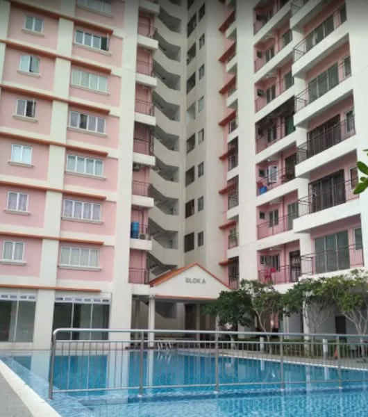 Exterior type: mid-rise condominium; features: pink painted facade, balconies with black railings, swimming pool, landscaped garden area, multiple storeys, entrance with awning, windows with white frames, staircase access, pool deck, surrounding greenery; style: modern.