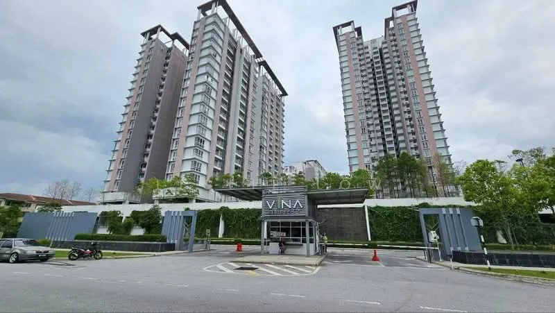 Exterior type: high-rise condominium; features: glass curtain wall, white painted facade, greenery along the base, manicured landscaping, double-volume main lobby, surrounded by mature greenery, parking area in front, modern architectural design; style: modern.