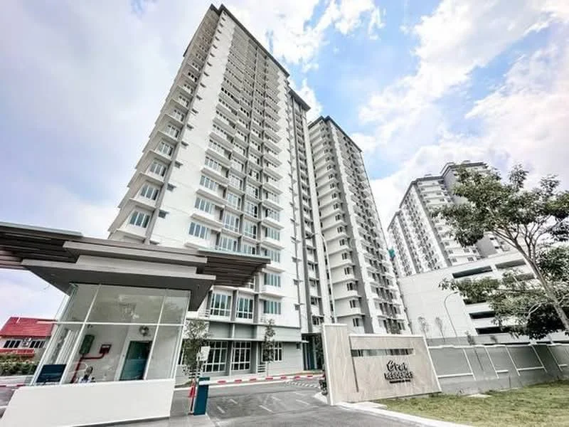 Exterior type: high-rise condominium; features: white painted facade, glass windows, multiple storeys, main entrance gate, guard house at entrance, landscaped area with trees, parking area, surrounded by greenery; style: modern.