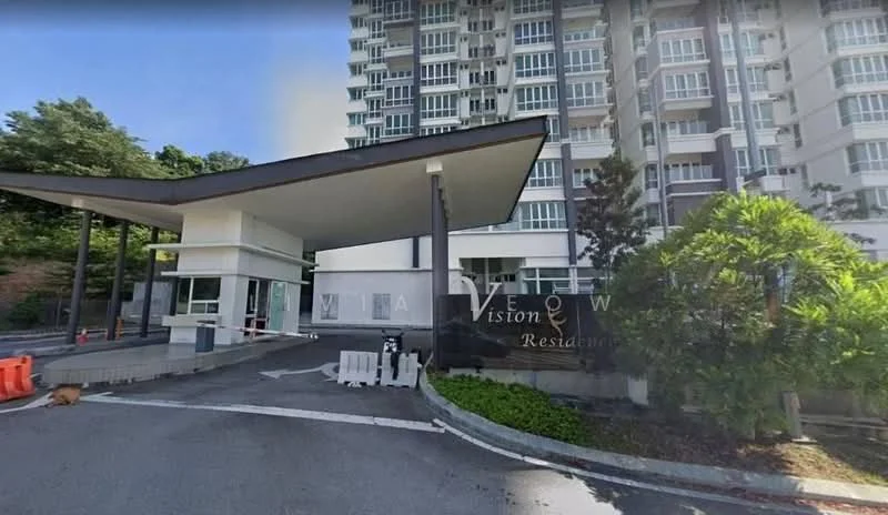 Exterior type: high-rise condominium; features: modern facade with glass windows, covered entrance with awning, landscaped greenery, paved driveway, security guardhouse, visible parking area, surrounded by trees, well-maintained exterior, multiple storeys, clear signage for the residence; style: modern.