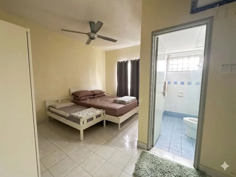 Bedroom features: 2 single beds with brown bedding, ceiling fan, cream painted walls, tiled flooring, window with dark curtains, built-in wardrobe, green area rug, light from window. Bathroom features: toilet, sink, shower area, blue tiled flooring, white tiled walls, window for natural light.