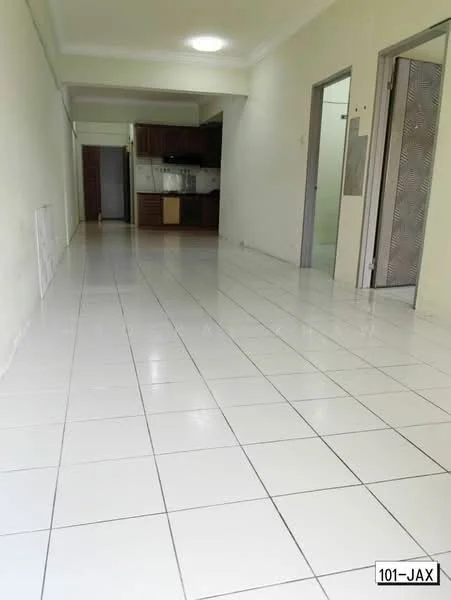 Room features: white painted walls, glossy white tile flooring, recessed ceiling lights, open layout, kitchen area visible in the background, doorway leading to another room, door leading to kitchen, neutral color scheme; style: modern.