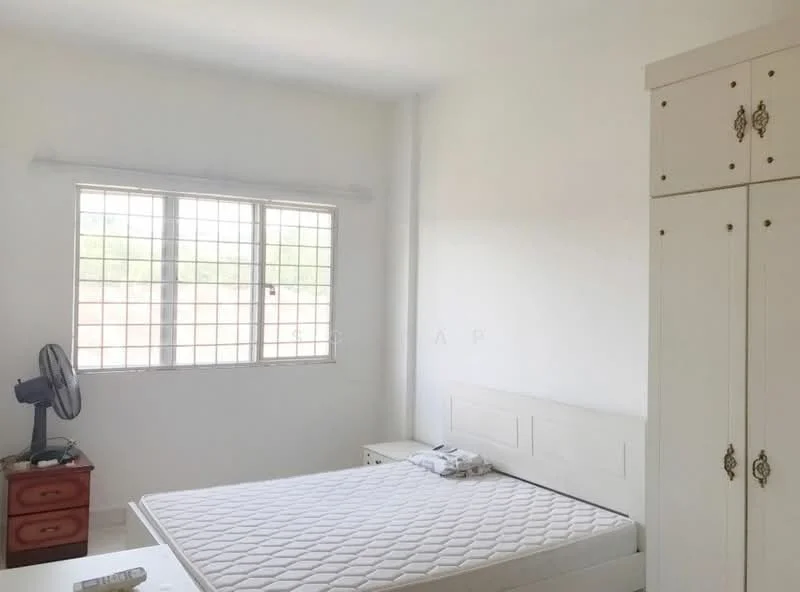 Bedroom features: white painted walls, window with grid pattern, queen-size bed frame without mattress, built-in wardrobe with decorative handles, wooden bedside table, ceiling fan, light-colored flooring; style: minimalist.