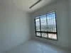Room features: white painted walls, large floor-to-ceiling windows, grey window frames, neutral flooring, no visible furniture, natural light from windows, minimalist design, unfurnished space; style: minimalist; view: city.
