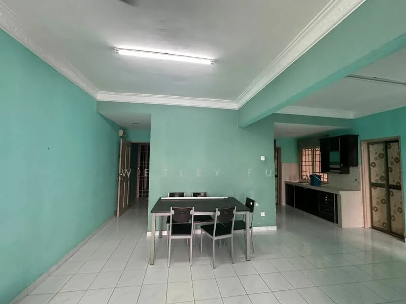 Room features: turquoise painted walls, white ceiling with crown moulding, white tiled flooring, dining table with four black chairs, open layout, kitchen area visible in background, window with natural light, fluorescent ceiling lights; style: modern.