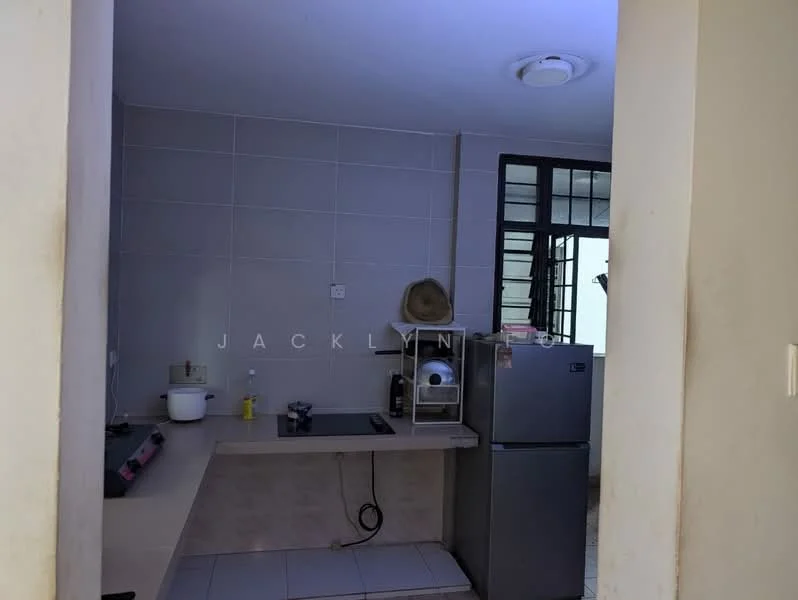 Kitchen features: white tiled walls, light grey tiled flooring, single-bowl stainless-steel sink, chrome pull-down faucet, built-in countertop with storage, stainless-steel fridge, microwave, kitchen cabinets, window for natural light, exposed electrical wiring, wall-mounted light fixture, open shelving; style: modern.