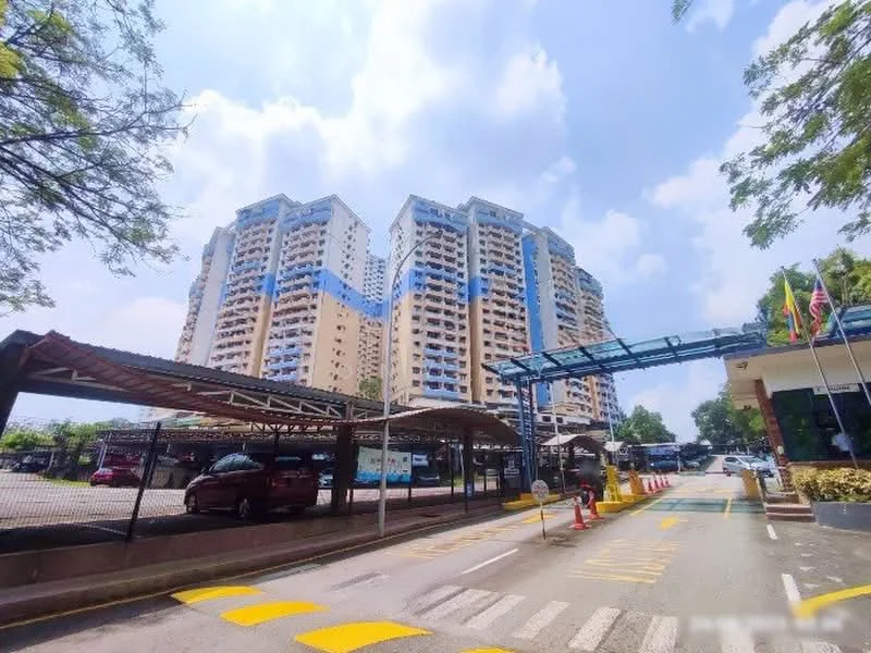 Exterior type: high-rise condominium; features: glass curtain wall, cream painted facade, double-volume main lobby, covered parking, guard house at entrance, perimeter fence, landscaped entrance, multiple storeys, surrounded by mature greenery; style: modern.