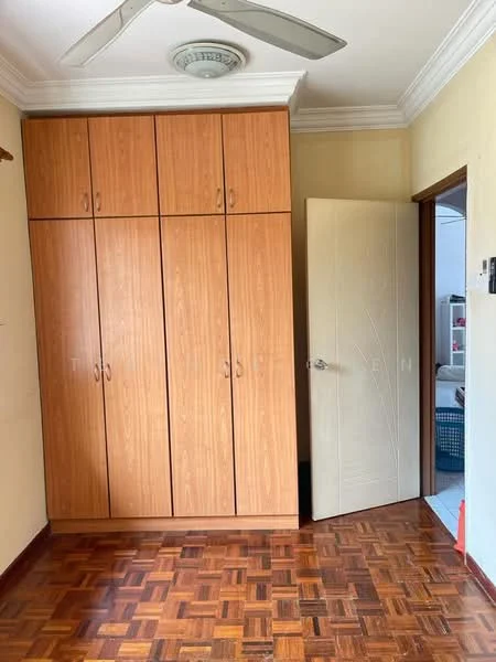Room features: wooden flooring, built-in wardrobe with multiple doors, cream painted walls, ceiling fan, door leading to another room.