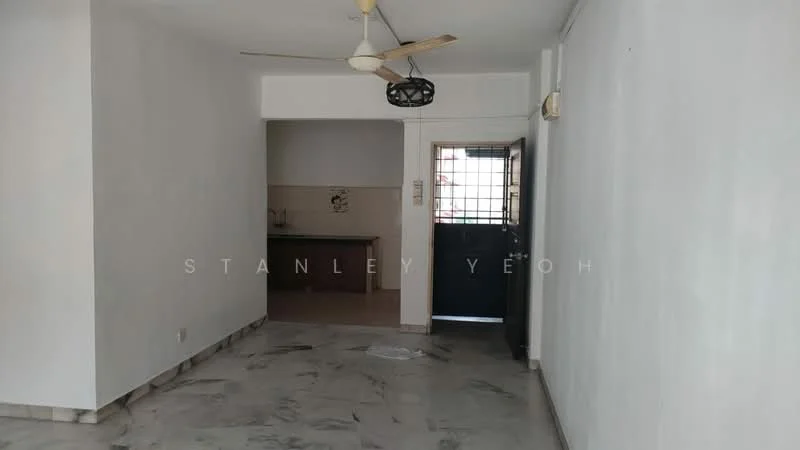 Living features: white painted walls, marble flooring, 5-blade ceiling fan, door with security grille, window with grille, kitchen counter visible in background, light switch, light fixture.