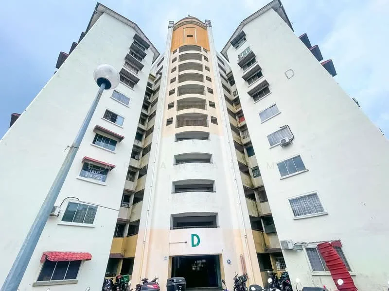 Exterior type: mid-rise condominium; features: white painted facade, yellow accent section, multiple balconies, exposed concrete, visible air conditioning units, staircase leading to entrance, ground-level parking area, street lamp, motorcycle parking, 5-storey building; style: modern.