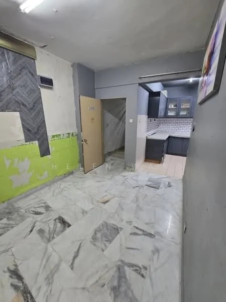 Room features: marble tile flooring, grey painted walls, kitchen cabinetry in dark colour, white tiled backsplash, door leading to another room, exposed wall with unfinished surface, ceiling lights, open layout; style: modern.