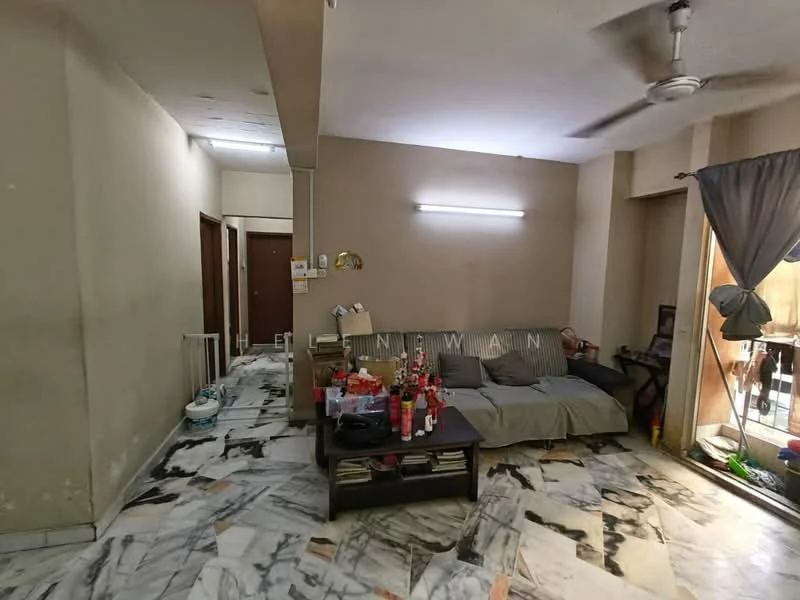 Living features: marble flooring, cream painted walls, ceiling fan, sofa with grey upholstery, coffee table, wall-mounted light fixture, sliding glass door, curtains, decorative items on table. Room features: doorway leading to hallway, doorway leading to another room.
