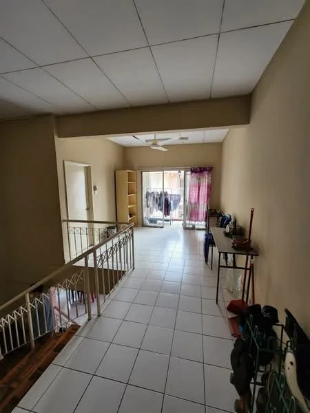 Room features: white painted walls, white ceiling tiles, ceramic tile flooring, 5-blade ceiling fan, sliding glass door, curtains in pink, open shelving unit, wooden table, clothes drying rack, decorative items on table; style: modern; view: garden.