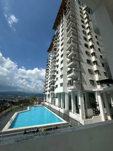 Exterior type: high-rise condominium; features: swimming pool, pool deck, balconies, white painted facade, multiple storeys, landscaped area, surrounded by greenery, city skyline in background; style: modern.