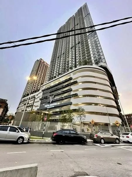 Exterior type: high-rise condominium; features: glass curtain wall, white painted facade, projecting balconies, feature lighting at night, approximately 30-storey high-rise, manicured landscaping, entrance with signage, surrounded by urban context; style: modern.