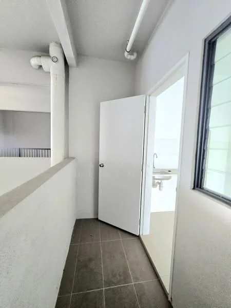 Room features: white painted walls, grey tiled flooring, door leading to another room, window with view, exposed ceiling beams, pipe fittings visible; style: modern.
