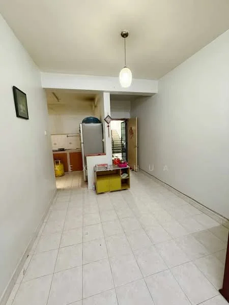 Room features: white painted walls, tile flooring, single pendant light, open layout, window with natural light, kitchen area visible in the background, small cabinet, yellow storage unit, doorway leading to another room; style: modern.